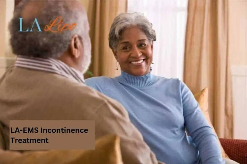 Couple sat smiling at each other - LA-EMS treatment Dormer's Wells