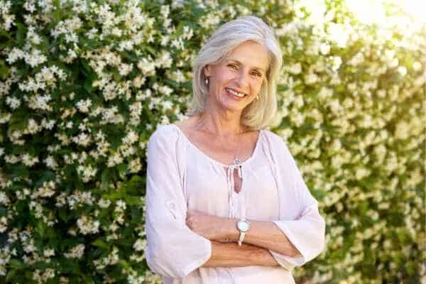 Older woman happy with urinary incontinence treatment Dormer's Wells
